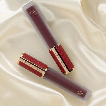 Matte SPF lip mousse lipstick tubes in red-burgundy