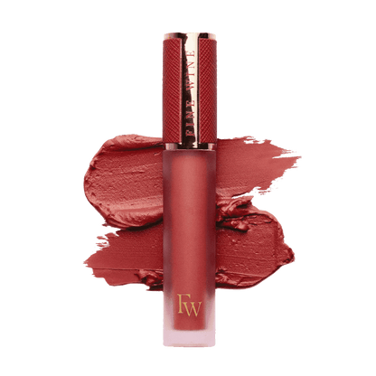 Matte SPF mousse lipstick in bright brick red, with lip color swatch and tube