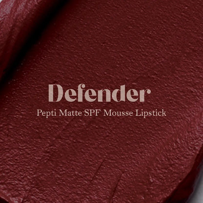 Matte SPF lip mousse lipstick swatch in deep burgundy