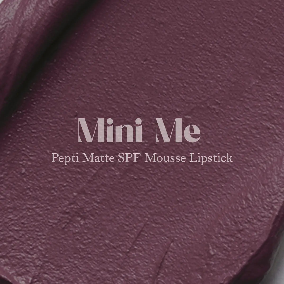 Mauve matte lip mousse swatch with textured finish, close-up