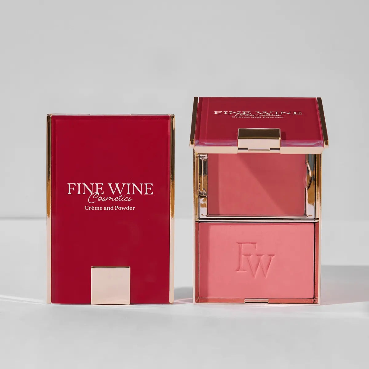 Bossy Blush Duo compact and open two-pan blush in rosy-red tones