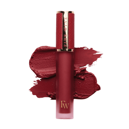 Matte SPF mousse lipstick in deep red, with lip color swatch and capped tube
