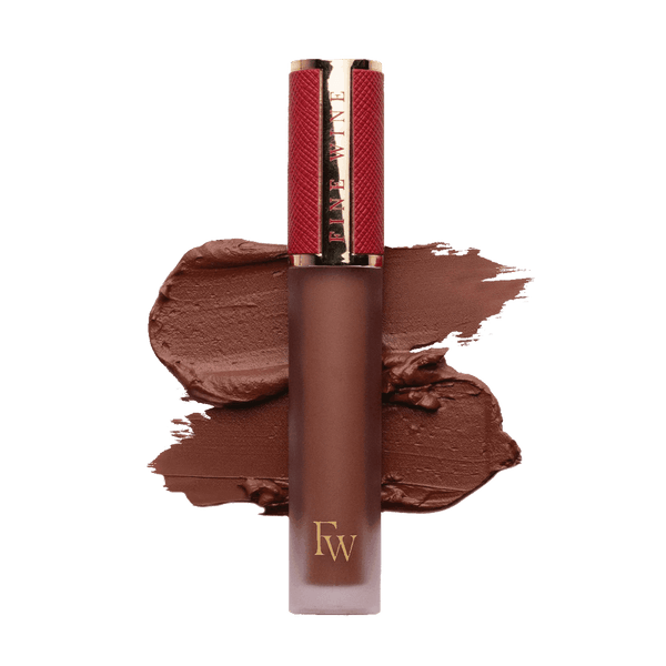 Matte SPF lip mousse lipstick tube with large swatch smear in a rose-brown tone