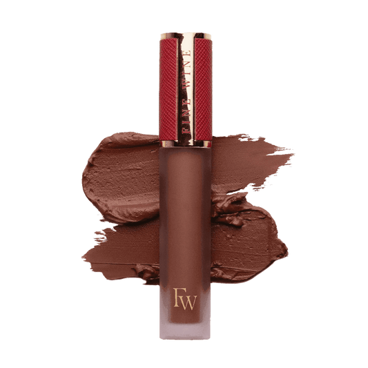 Matte SPF lip mousse lipstick tube with large swatch smear in a rose-brown tone