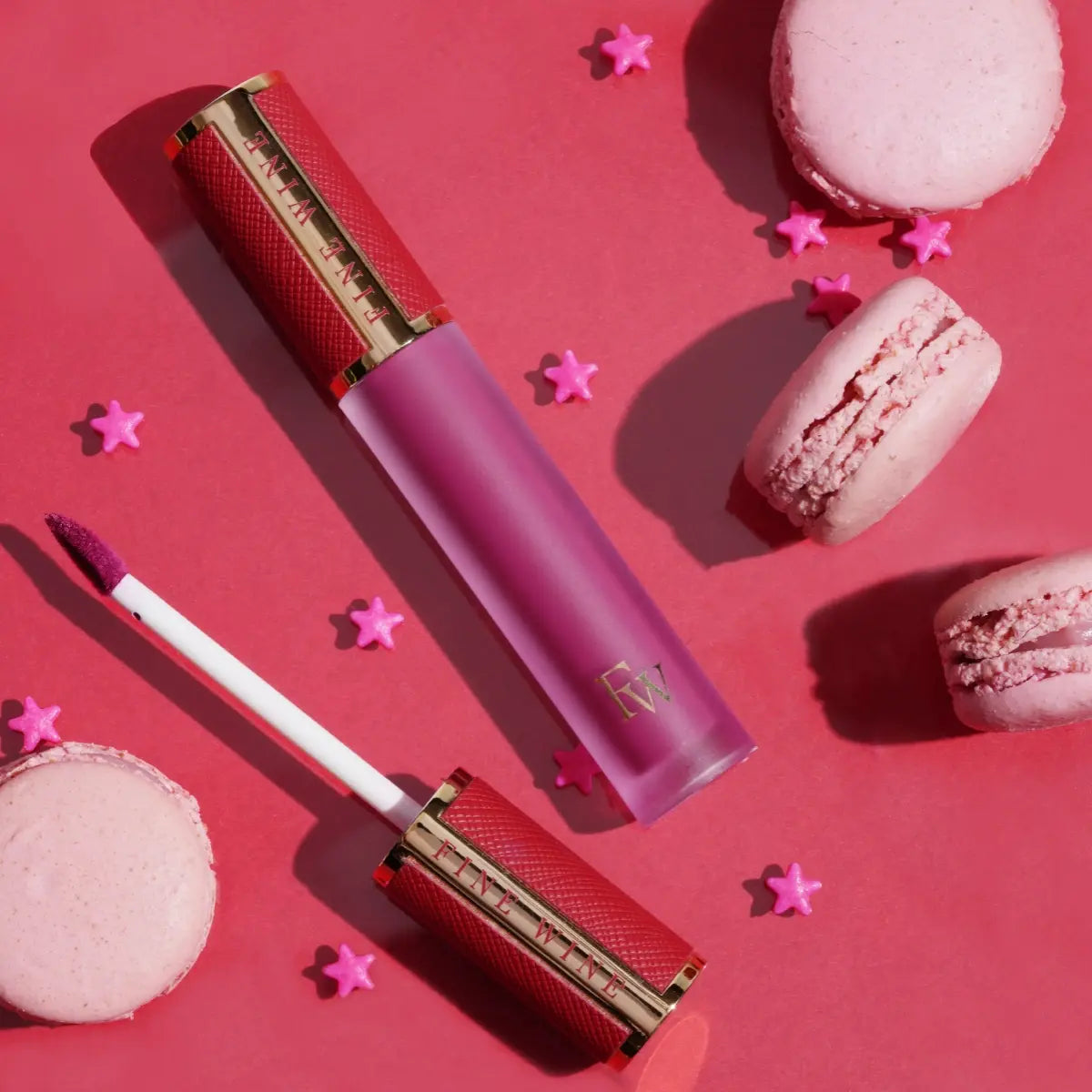 Matte lip mousse lipstick set with pink and purple tubes and lip tool